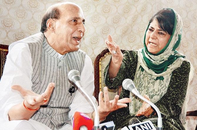 Union Home Minister Rajnath Singh and Jammu and Kashmir chief minister Mehbooba Mufti in Srinagar. PIC/PTI
