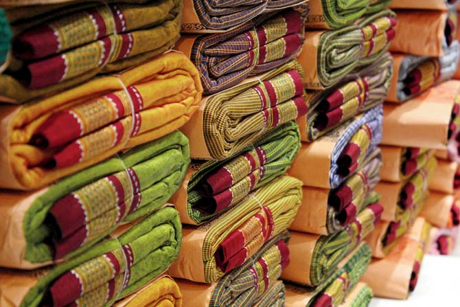 Shelves with Ilkal saris in Solapur