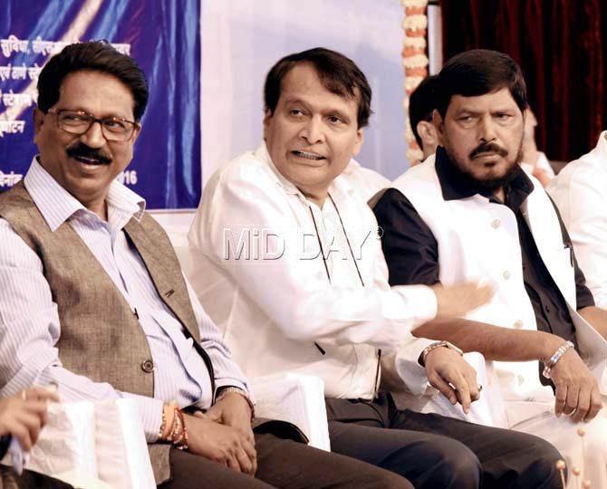 Rail Minister Suresh Prabhu did not give a direct answer when RPI leader Ramdas Athawale questioned him about the AC locals during the inauguration programme in Dadar. Pic/Pradeep Dhivar