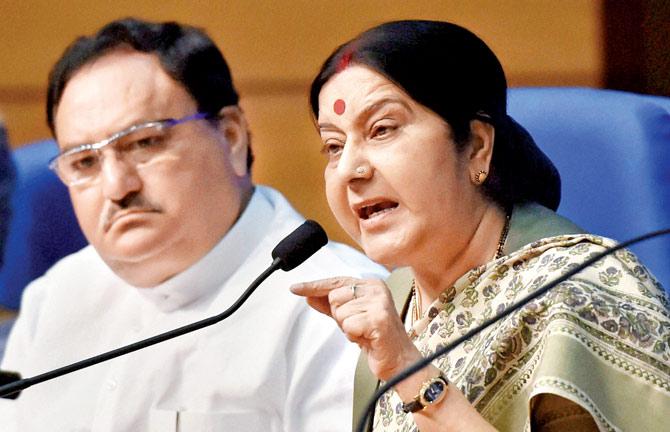External Affairs Minister Sushma Swaraj and Union Health Minister J P Nadda address a press conference after the Union Cabinet gave its approval for the introduction of Surrogacy (Regulation) Bill PIC/PTI