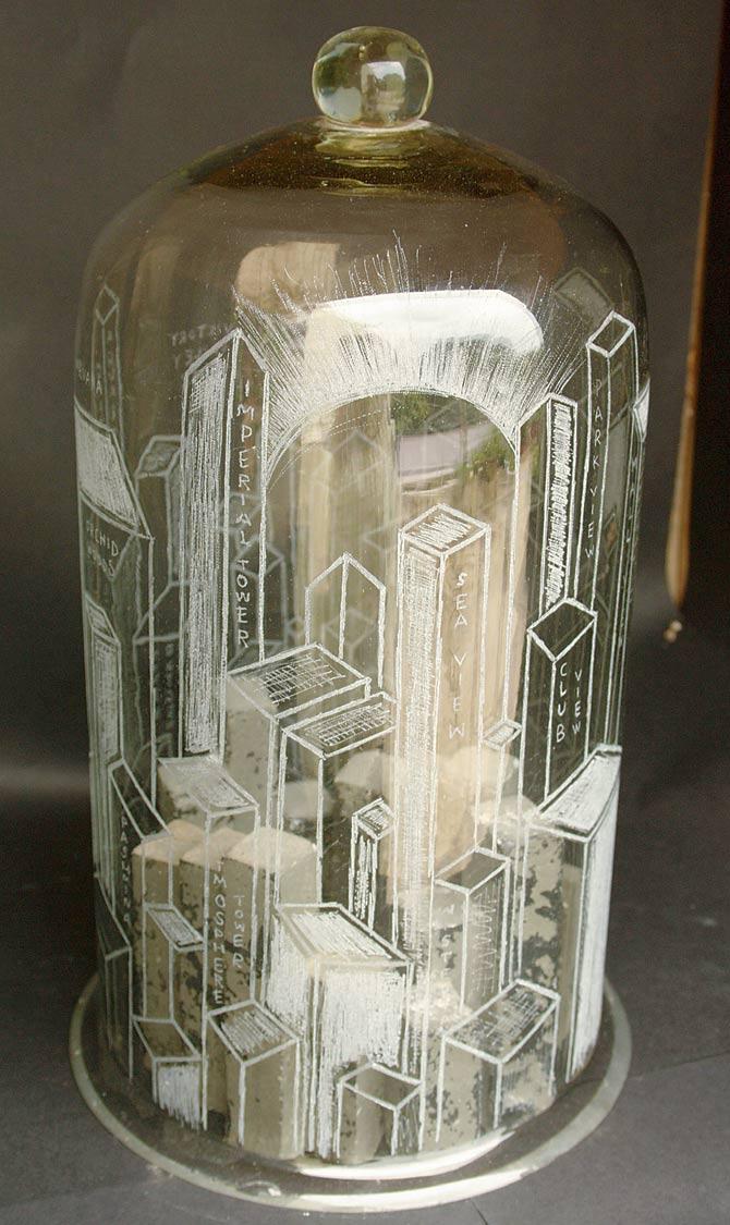 Valay Gada’s sculptures in bell jars like this one titled, Aspirations, highlight how our ambition for urbanisation is destroying the nature