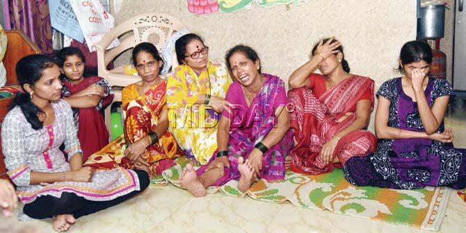 Relatives and friends of the Waje family were inconsolable on receiving news of two members’ bodies being fished out of the Savitri river. Pic/Suresh Karkera
