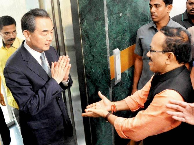 China’s Foreign Minister Wang Yi and Goa Chief Minister Laxmikant Parsekar before a meeting in Panaji in Goa. Pic/AFP