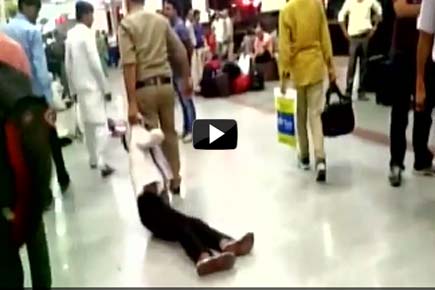 Video: Thief thrashed unconscious, dragged by railway cop in MP