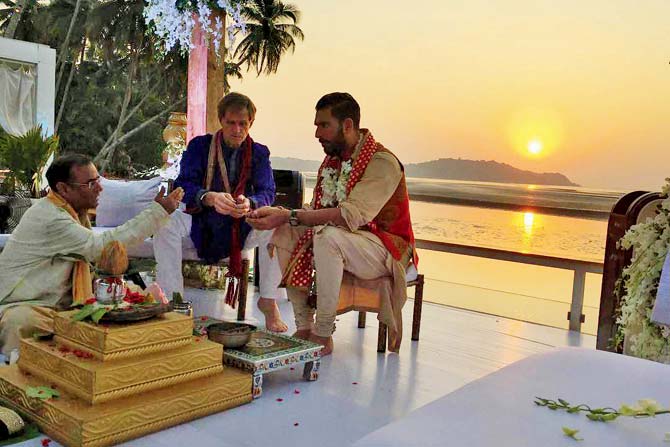 Yuvi performs wedding rituals with the sunset in the backdrop