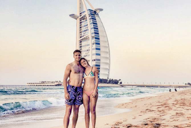 Jos Buttler and girlfriend Louise Webber pose in front of the iconic Burj Al Arab hotel. PIC/butler’s Instagram account