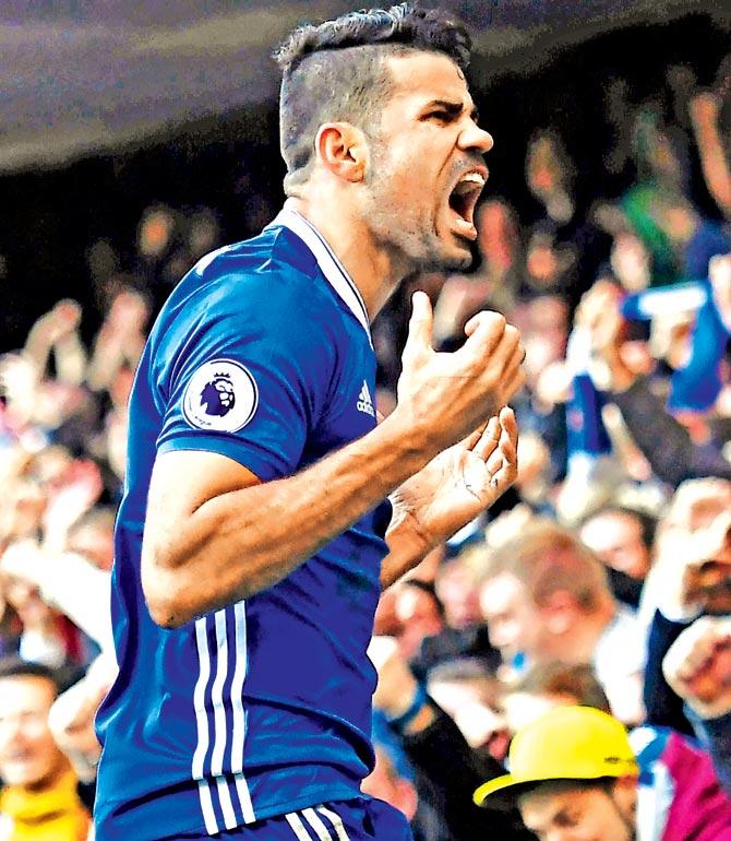 Diego Costa celebrates scoring against West Bromwich. Pic/AFP