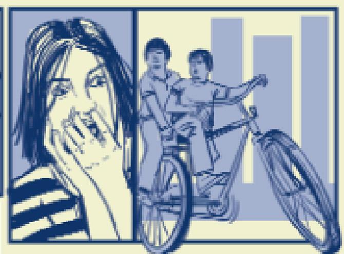 She panics when she spots two kids riding their bicycles ahead of the car