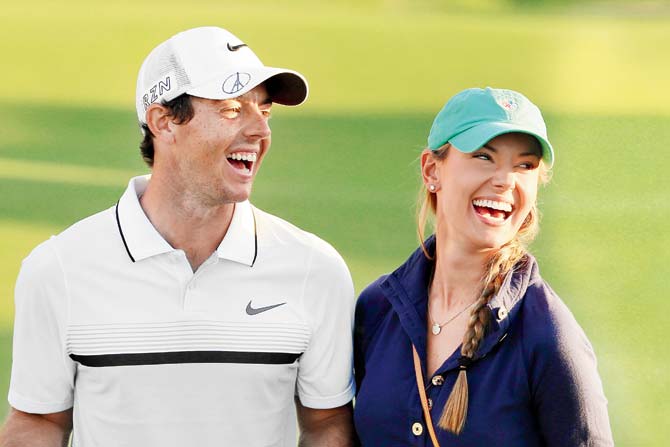 Rory McIlroy and Erica Stoll. Pic/AFP 
