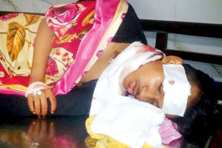 Trying to spit, teen's neck slit open after falling off Mumbai local train