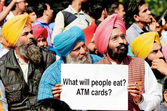 Citizens protest in New Delhi soon after the demonetisation announcement. Pic/PTI