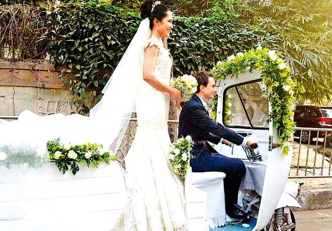 Newly-weds Sandia Furtado and Mattoe Busa take a ride around Bandra in a decorated autorickshaw. Pic/Facebook