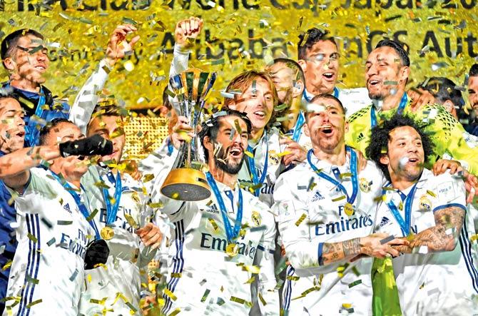 Real Madrid players celebrate after winning the FIFAâu00c2u0080u00c2u0088Club World Cup final against Kashima Antlers of Japan yesterday. Pic/AFP