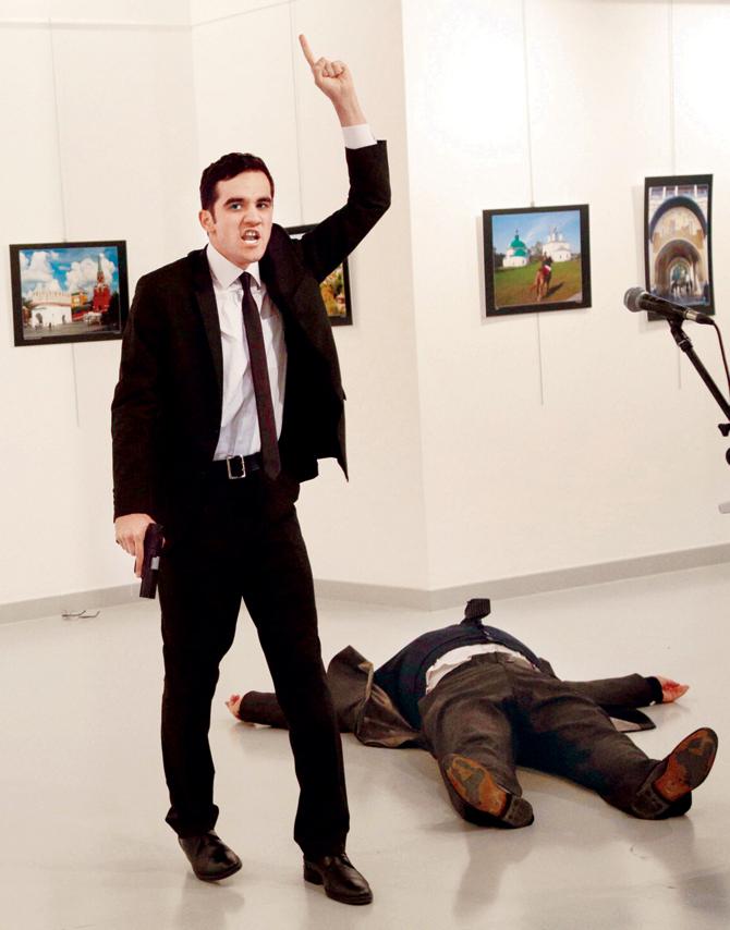 The photograph taken by AP photographer Burhan Ozbilici of the murder of Andrei Karlov, the Russian Ambassador to Turkey, at a photo gallery in Ankara, Turkey, on December 19 