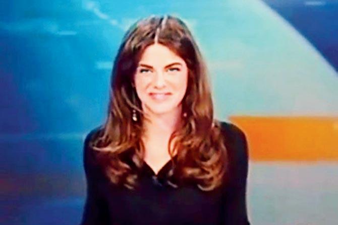 News flash? Beautiful newsreader accidentally flashes knickers on live TV