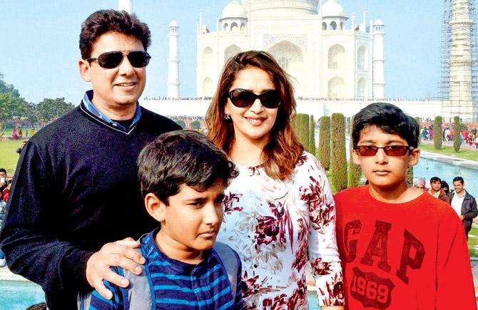Madhuri Dixit with husband Shriram Nene and sons Arin and Ryan. Pic/PTI
