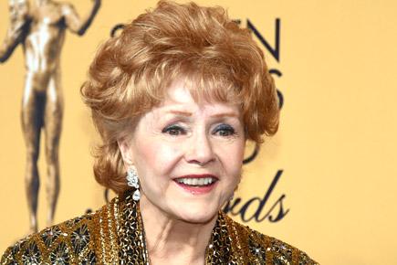 'Singin' in the Rain' actor Debbie Reynolds dies one day after daughter Carrie Fisher 