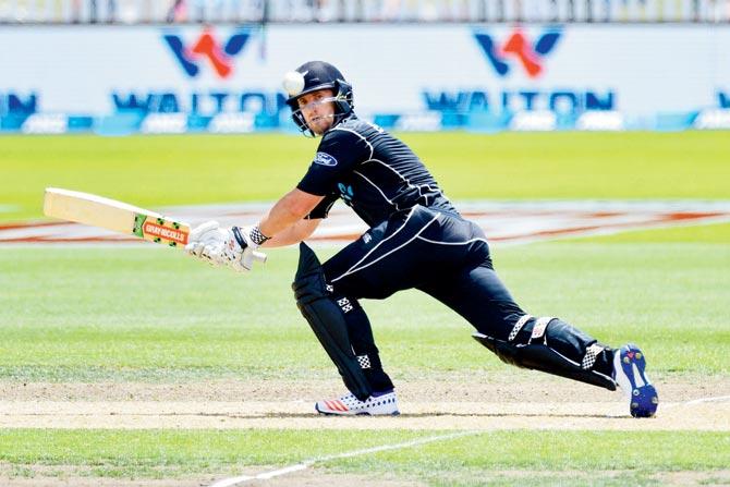 New Zealand’s Neil Broom sweeps one en route his unbeaten 109 during the 2nd ODI against Bangladesh in Nelson this morning. Pics/AFP