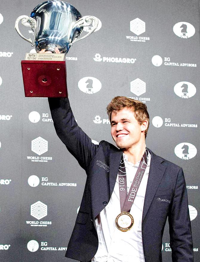 Norway's Magnus Carlsen retains World Chess Championship after tie-breaker