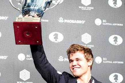 Magnus Carlsen beats Sergey Karjakin to retains world chess title