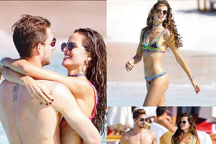 PSG star Kevin Trapp and Victoria's Secret model Izabel heat it up on the beach