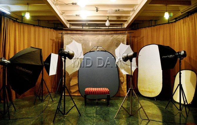 The photo studio, situated in the basement of Indian Art Studio, still boasts of original tungsten bulbs and 100-year-old hand-painted canvas backdrops, which were used for the shoots. Pics/Suresh Karkera