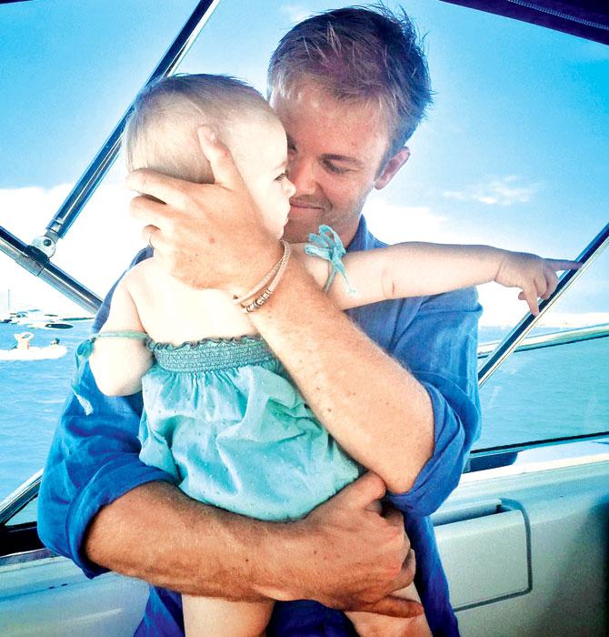 Rosberg with his daughter Alaia. Pic/Nico