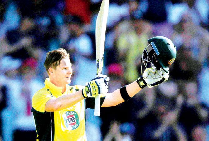 Australia captain Steven Smith celebrates after completing his ton against New Zealand during the ODIâu00c2u0080u00c2u0088in Sydney yesterday. Pic/AP,PTI