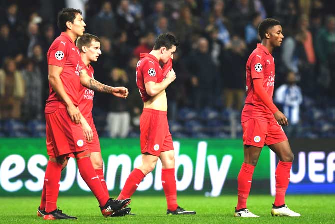 Leicester City players walk after being defeated 5-0 at the end of the UEFA Champions League football match FC Porto vs Leicester City FC at the Dragao stadium in Porto. Pic/AFP