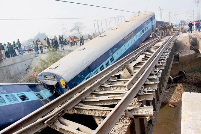 Wrecked coaches of the Ajmer-Sealdah express train which derailed near Rura railway station in Kanpur Dehat district. Pic/PTI