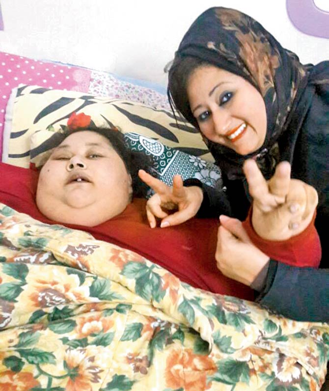 Eman’s sister Shaimaa (right) has been struggling for years to get her back on her feet
