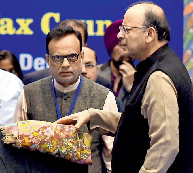Union Finance Minister, Arun Jaitley and Revenue Secretary Hasmukh Adhia at the sixth Goods and Services Tax (GST) Council meeting in New Delhi yesterday. Pic/PTI