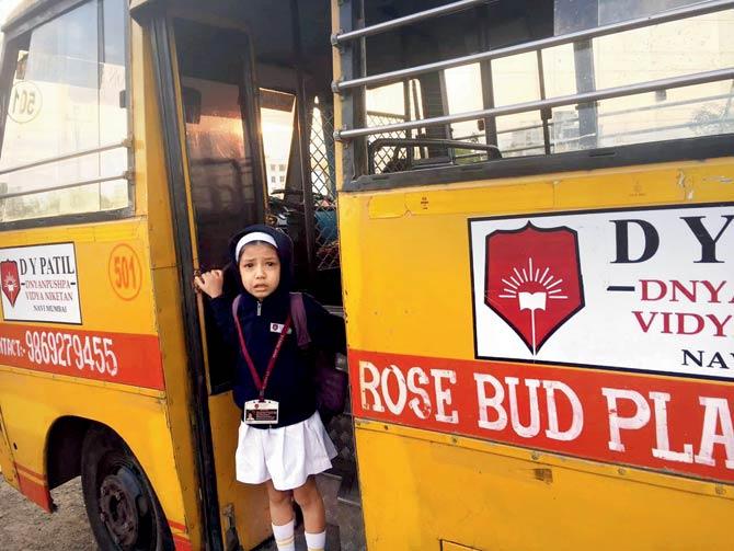Passer-by finds child alone in school bus parked on road