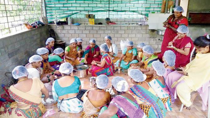 The women get together to cook up the Malvani meal near the Sawantwadi railway station