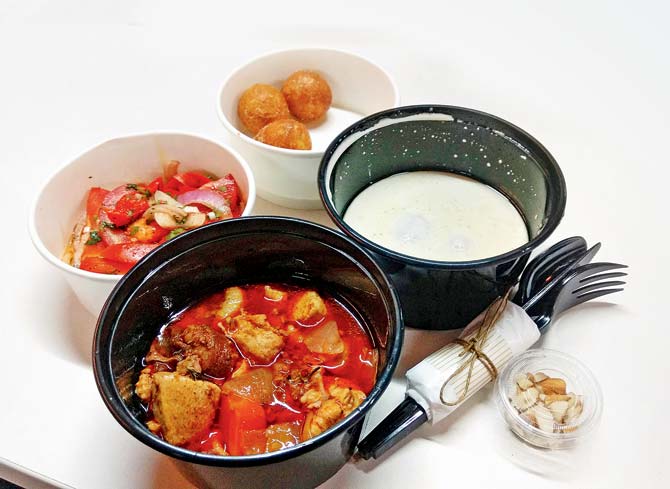(Clockwise from left) Red Pepper Salad, Bunuelo, Ajoblanco Soup with melon and Cocido Stew with Chicken and Chorizo