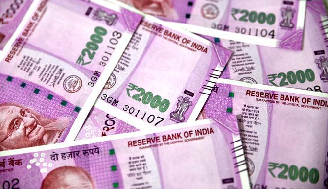 Mumbai Customs sleuths today seized cash totalling around Rs 69 lakh in two separate cases here, which included recovery of Rs 25 lakh in 2,000 rupee notes