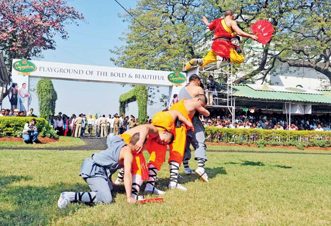 Zen and the art of getting the crowds into the race course: Shaolin monks perform at the paddock. The entertainment has been skewed towards the members side