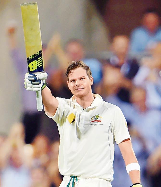  Australia’s captain Steven Smith celebrates his century during the first day-night cricket Test against Pakistan in Brisbane on December 15. Pic/AFP