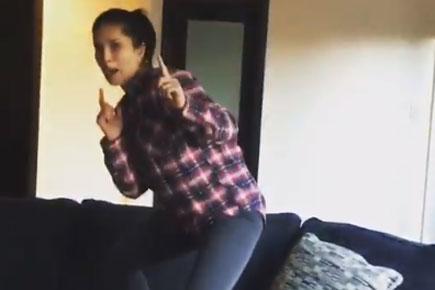 Watch Sunny Leone jump on a couch and dance wildly!