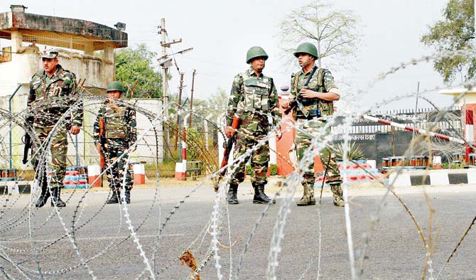  Army personnel stand guard at 16 Corps headquarters during the search operations following the attack. PIC/PTI