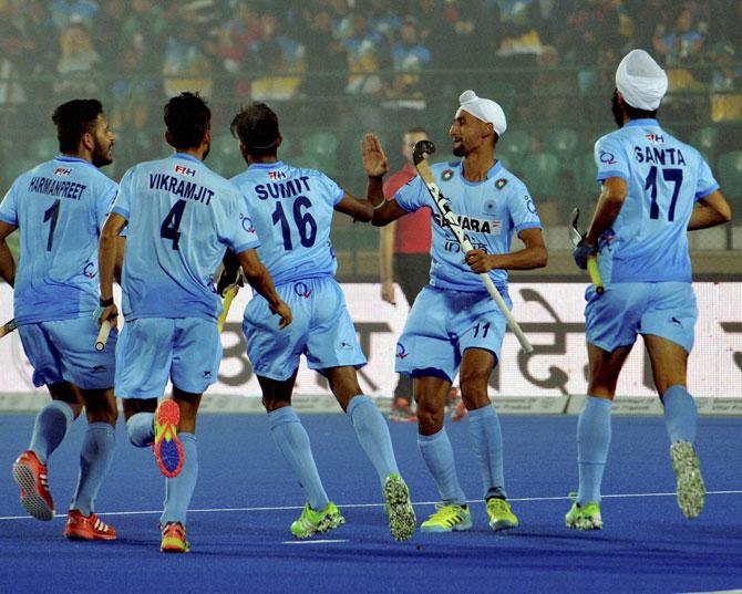 Indian Hockey Mandeep Singh celebrating 1st goal with team mates against Canada at Jr. World Cup Hockey Tournament at Major Dhyanchand Stadium in Lucknow on Thursday.