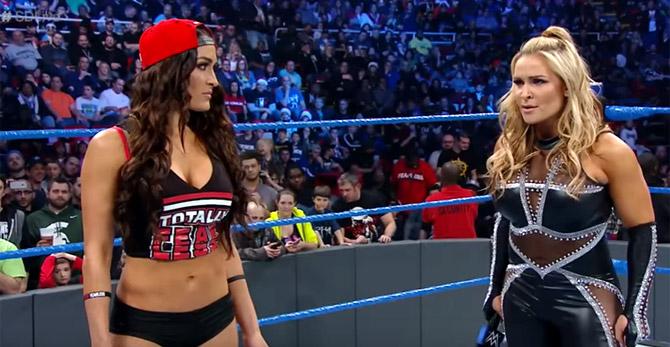 Nikki Bella and Natalya (R)
