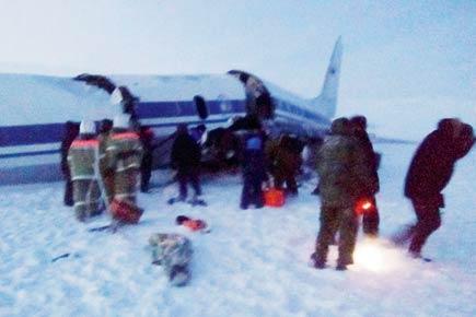 Russian military plane crashes in Siberia, injures 32