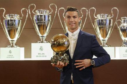 Cristiano Ronaldo beats Lionel Messi to win his fourth Ballon d'Or award