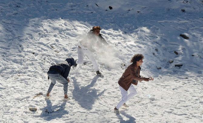 Children enjoying snow at Mahashu peak at Kufri, 17 Kms from Shimla on Monday. Pic/PTI