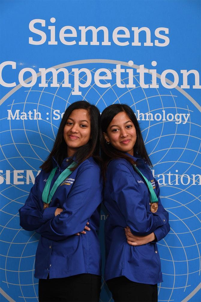 Identical twin sisters Adhya and Shriya Beesam shared the USD 100,000 grand prize in the Team category of the17th annual Siemens Math, Science and Technology Competition for their work in developing a new approach to diagnose schizophrenia earlier in patients using both brain scans and psychiatric evaluations. They are both 11th grade students in Plano, Texas. (Photo credit: Siemens Foundation/via IANS)