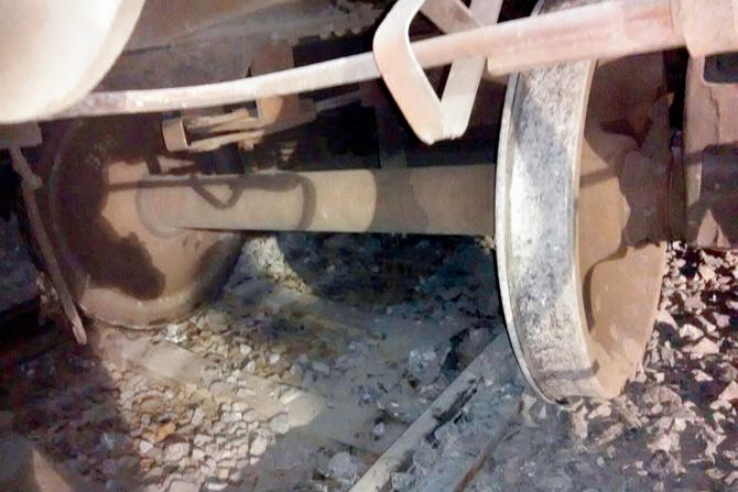 The wheels ran onto the stones on the tracks, leading to the derailment. As per procedure, the rocks should have been cleared before, but workers were in a rush to meet the deadline