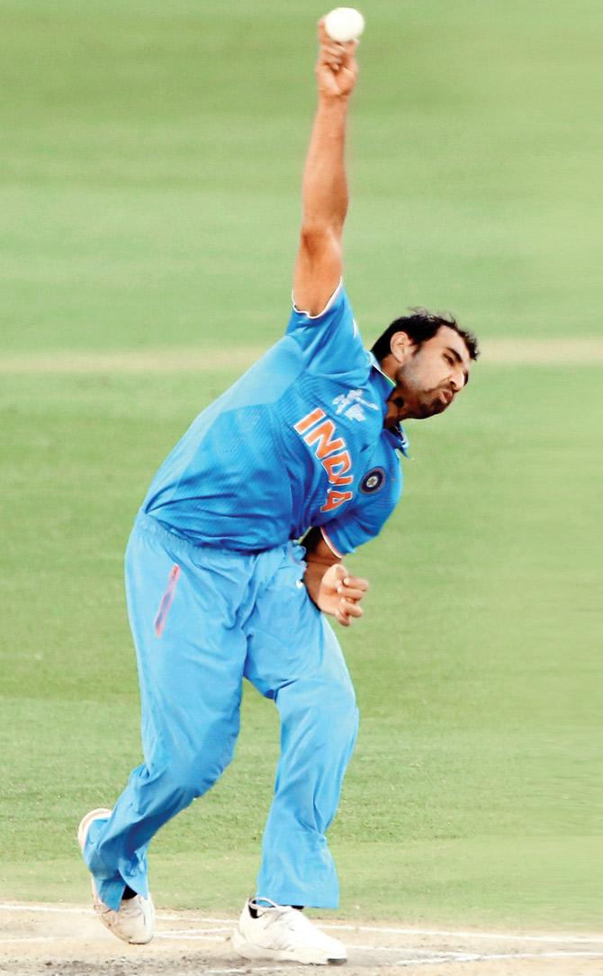 India’s Mohammed Shami bowls during the 2015 ICC World Cup warm-up match against Afghanistan at the Adelaide Oval on Feb 10 last year.  PIC/Getty Images