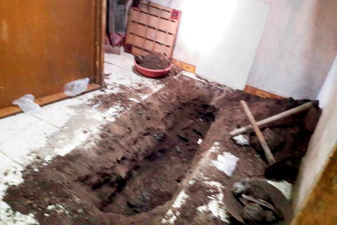 The body was found in this spot under the bedroom floor.