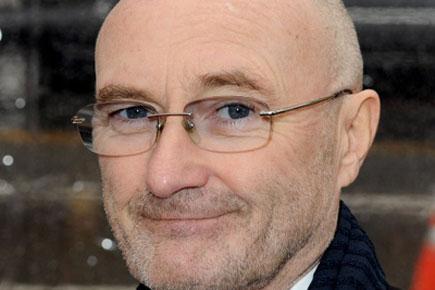 Phil Collins rushed to hospital after falling on way to toilet
